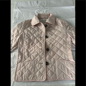 Girls Burberry quilted long sleeve patch pocket jacket.